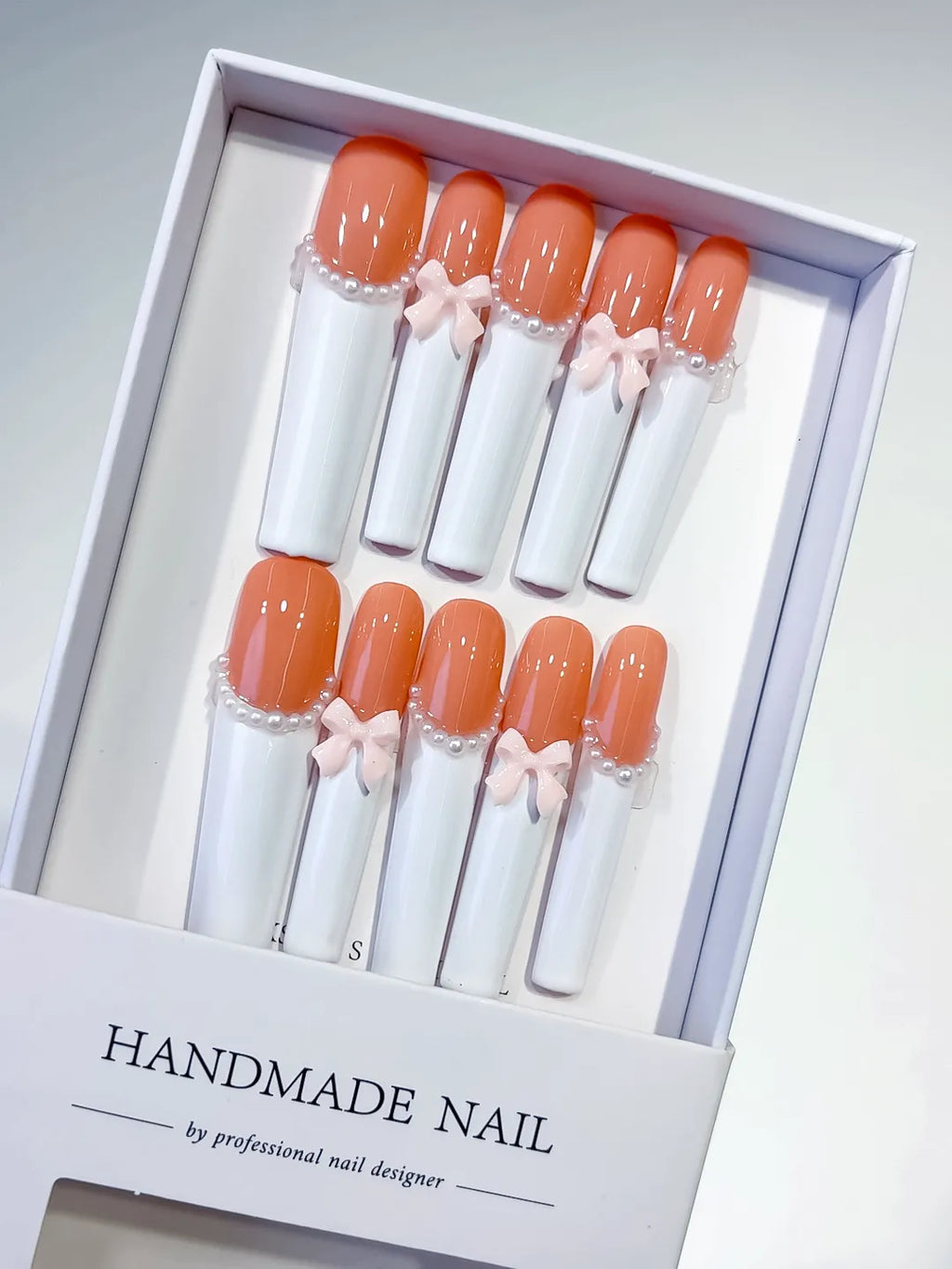 K022 - Long Orange White Square French tip Bow Pearl