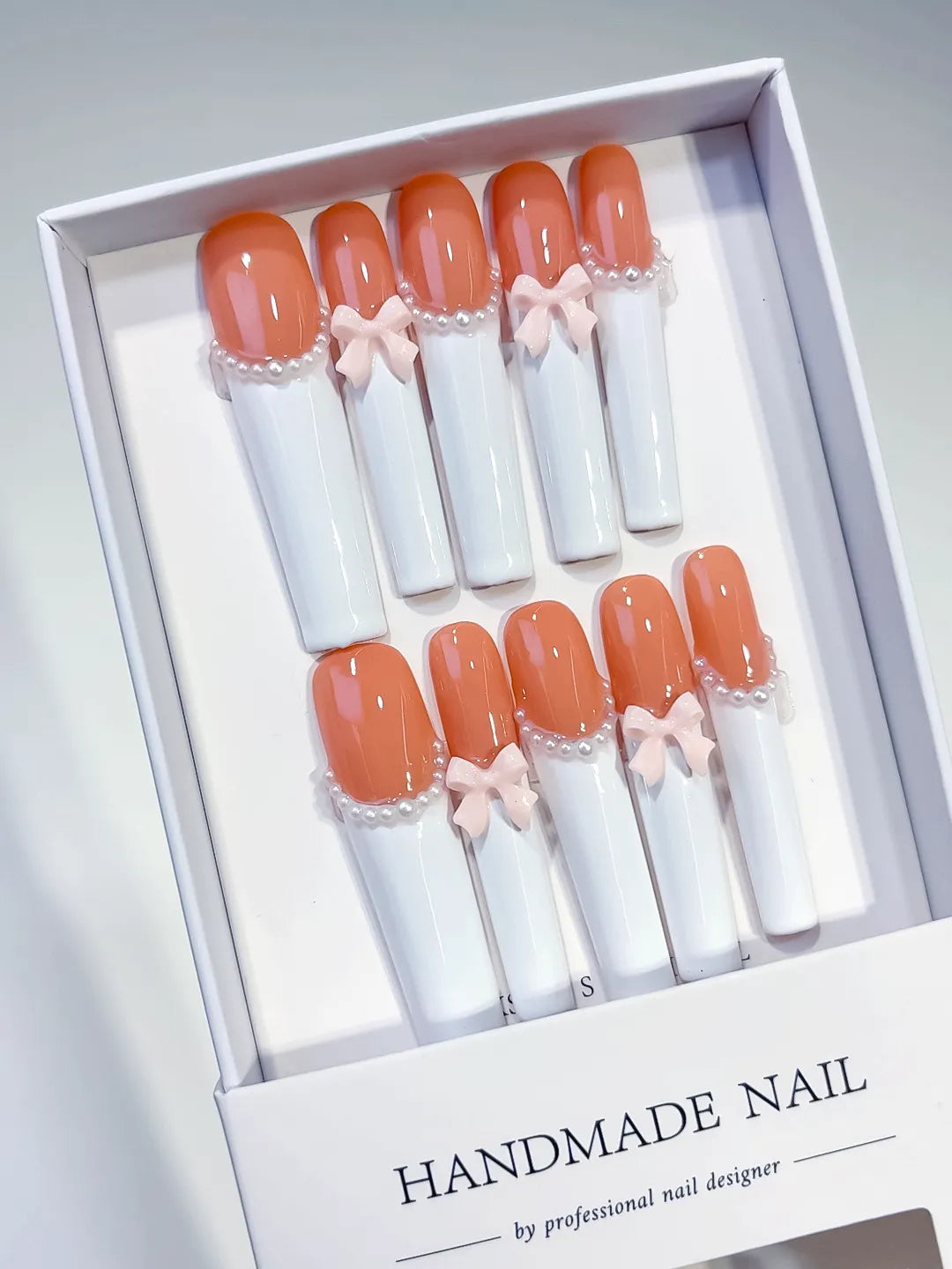 K022 - Long Orange White Square French tip Bow Pearl