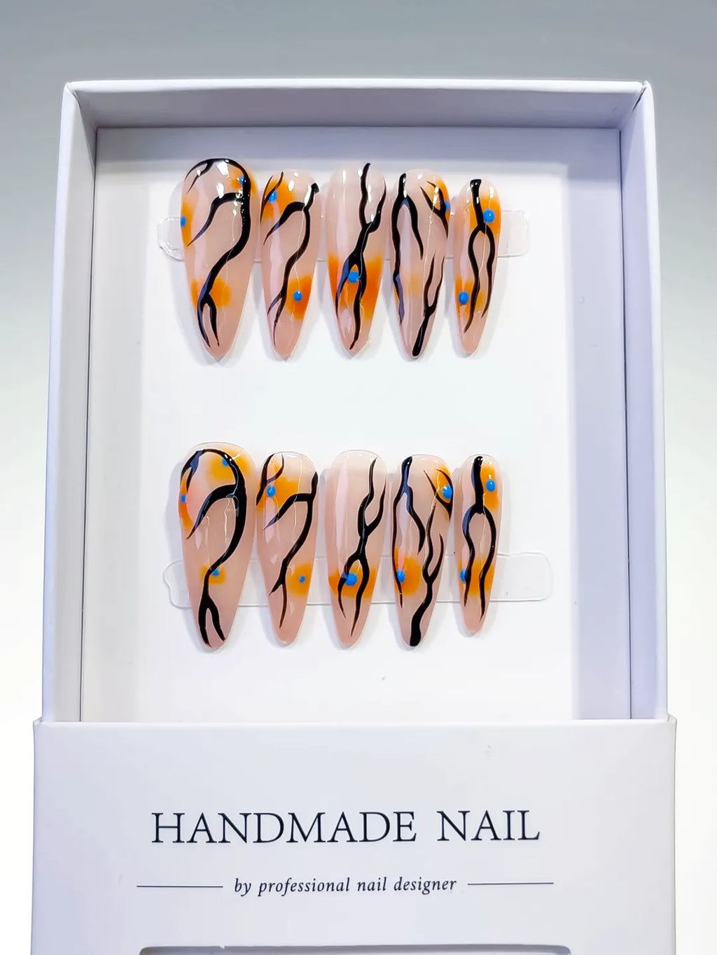 L030 - Long Nude Orange Stiletto Abstract Dot Pattern