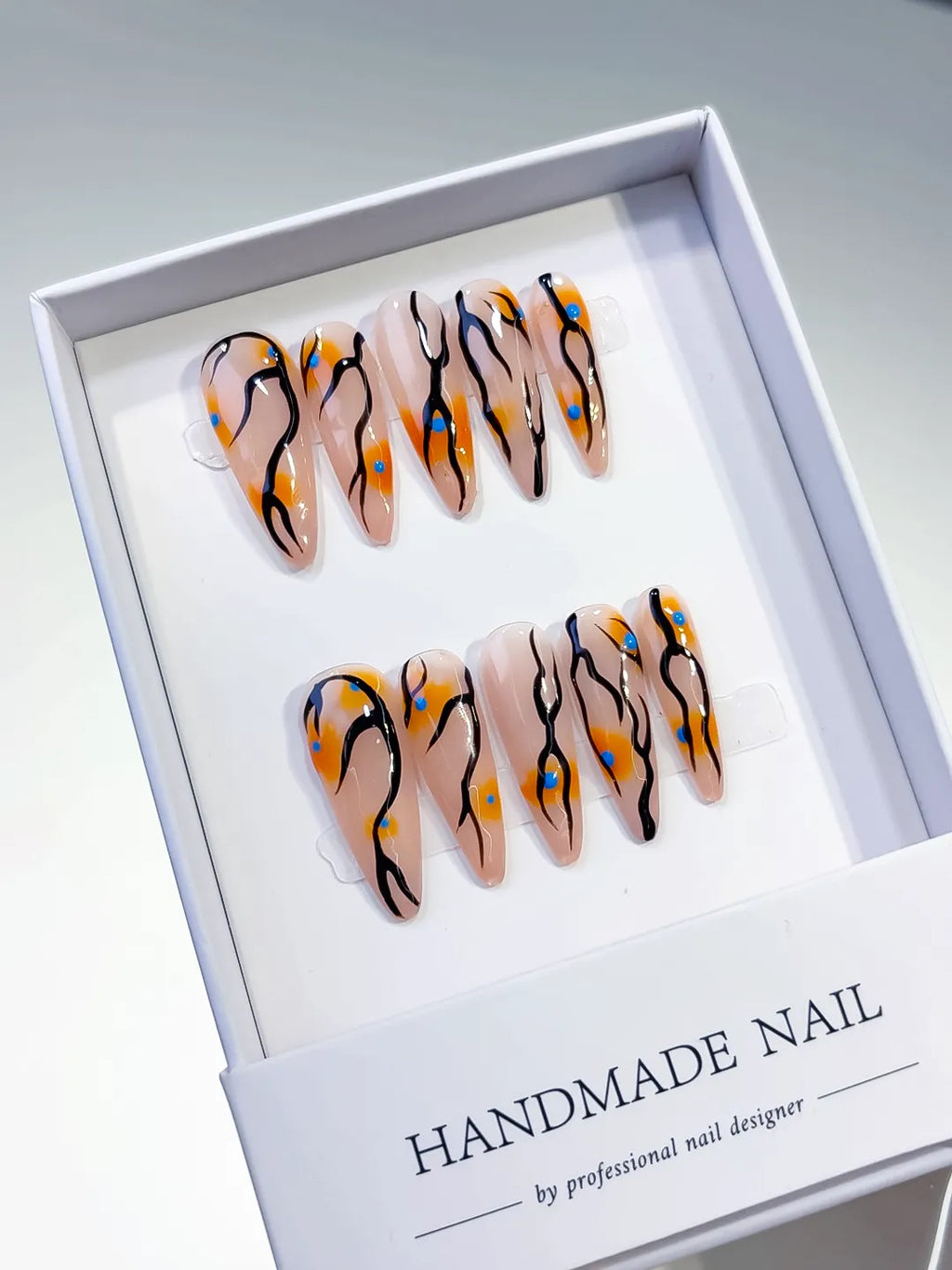 L030 - Long Nude Orange Stiletto Abstract Dot Pattern
