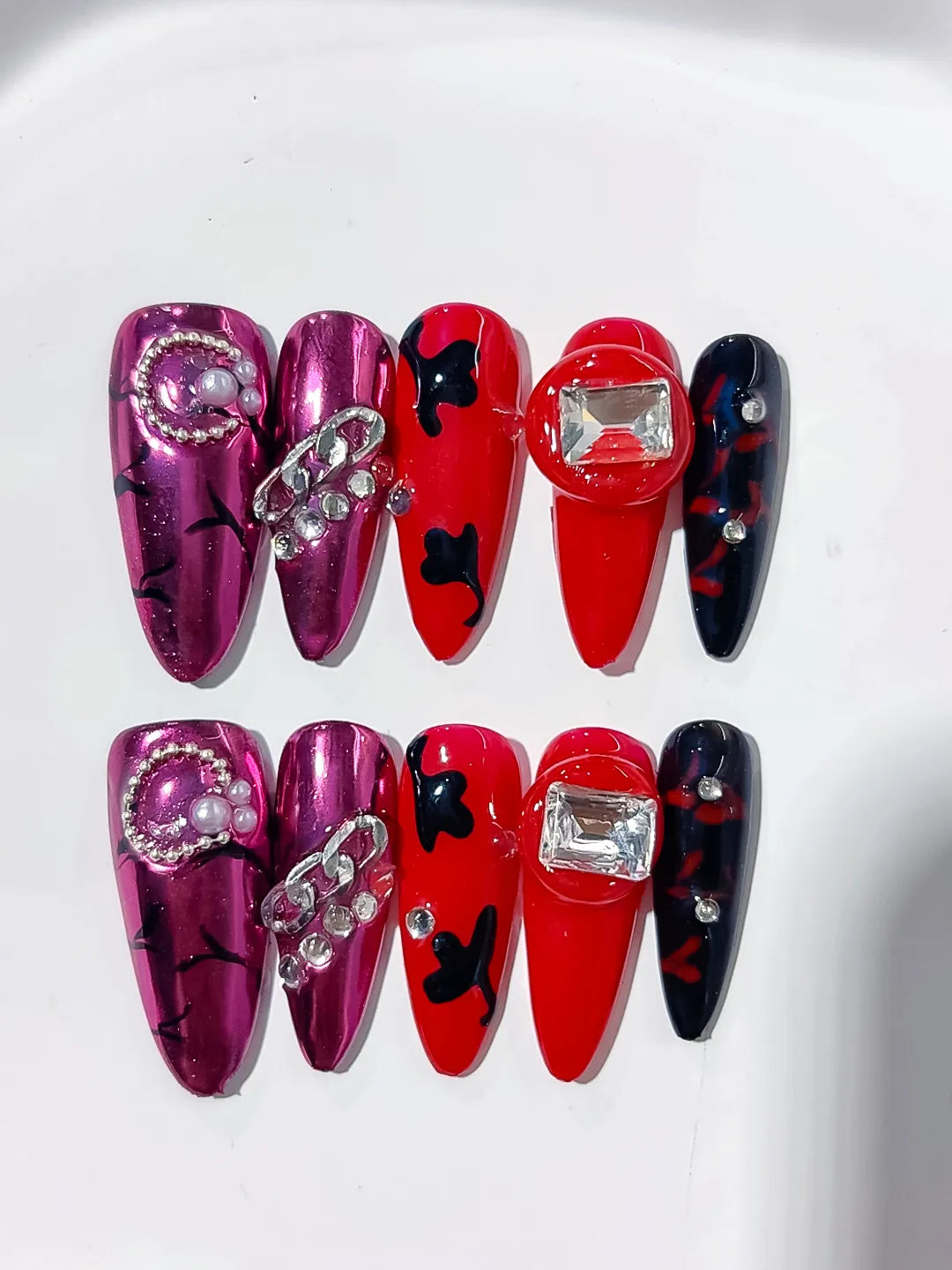 L032 - Long Pink Red Oval Metallic Bow Pearl
