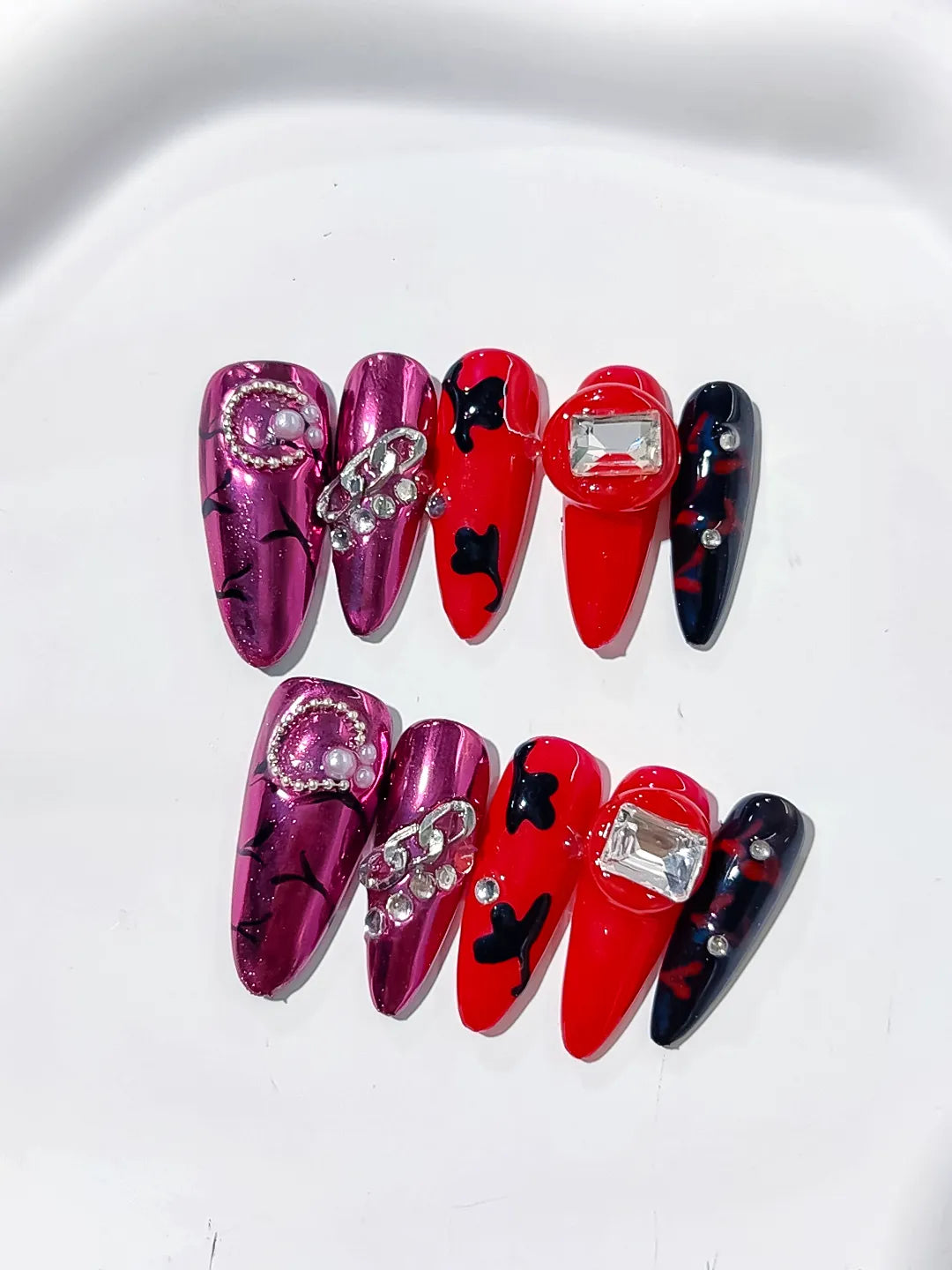 L032 - Long Pink Red Oval Metallic Bow Pearl