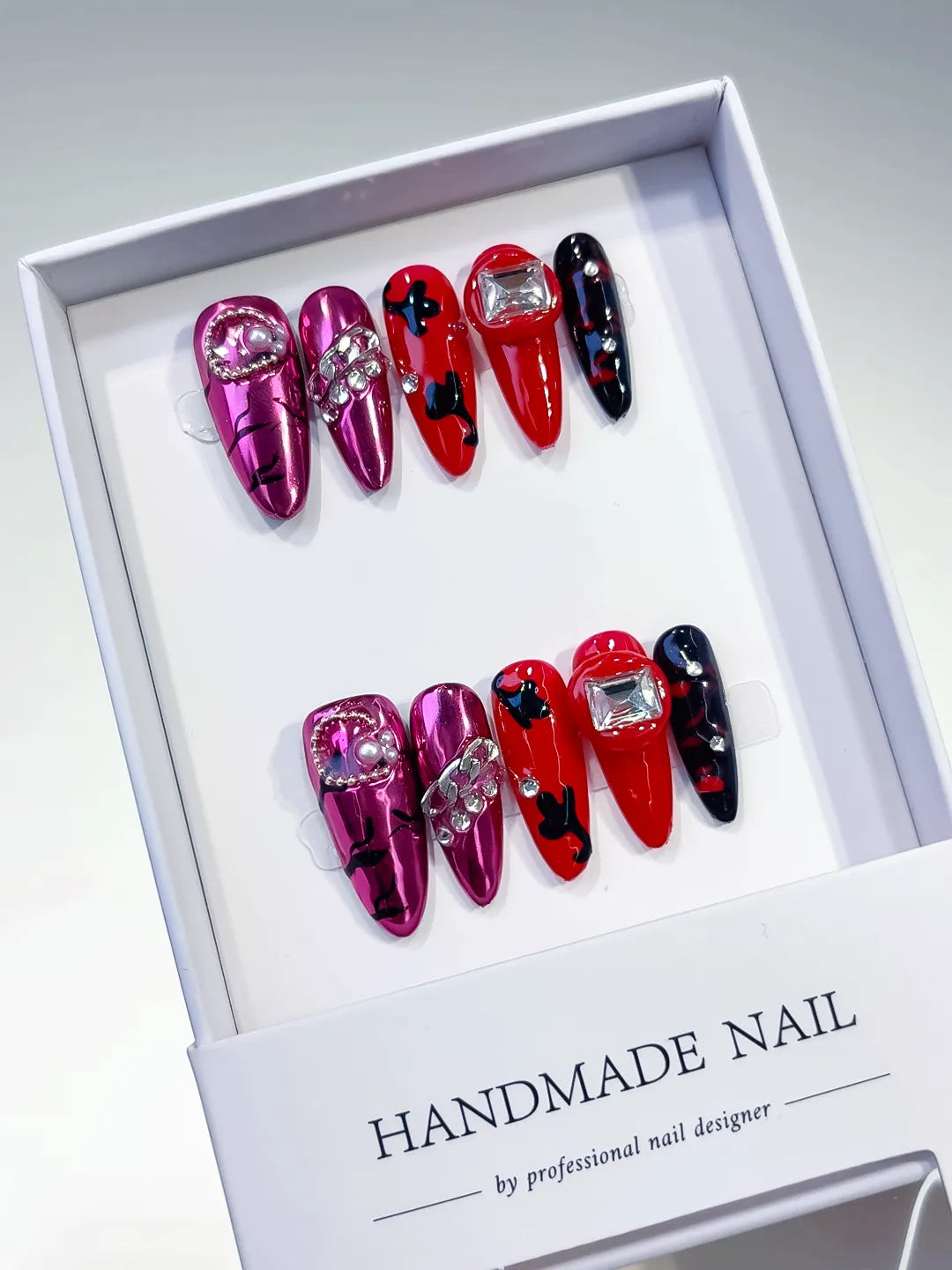 L032 - Long Pink Red Oval Metallic Bow Pearl