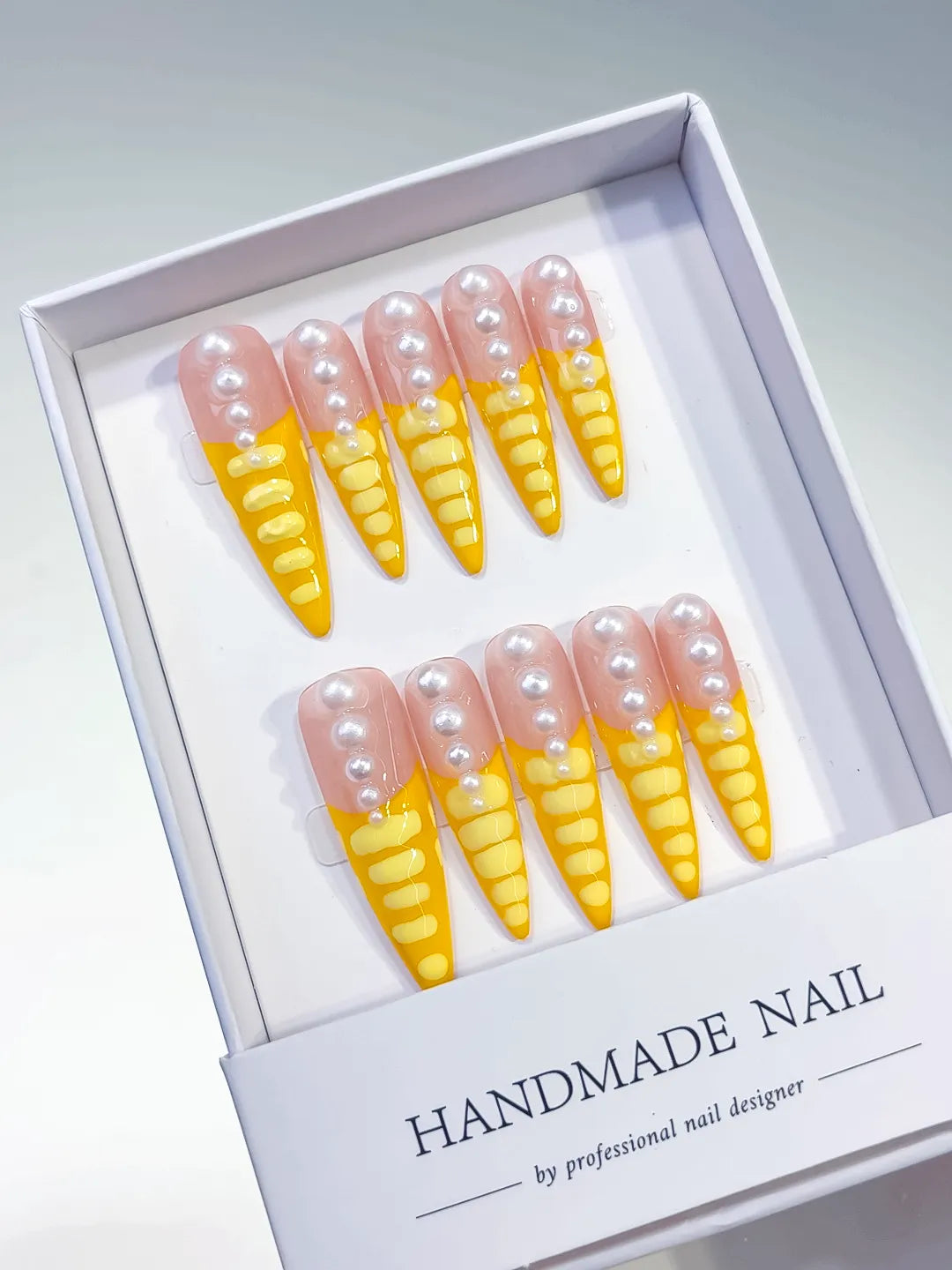 L033 - Long Nude Yellow Stiletto French tip Pearl