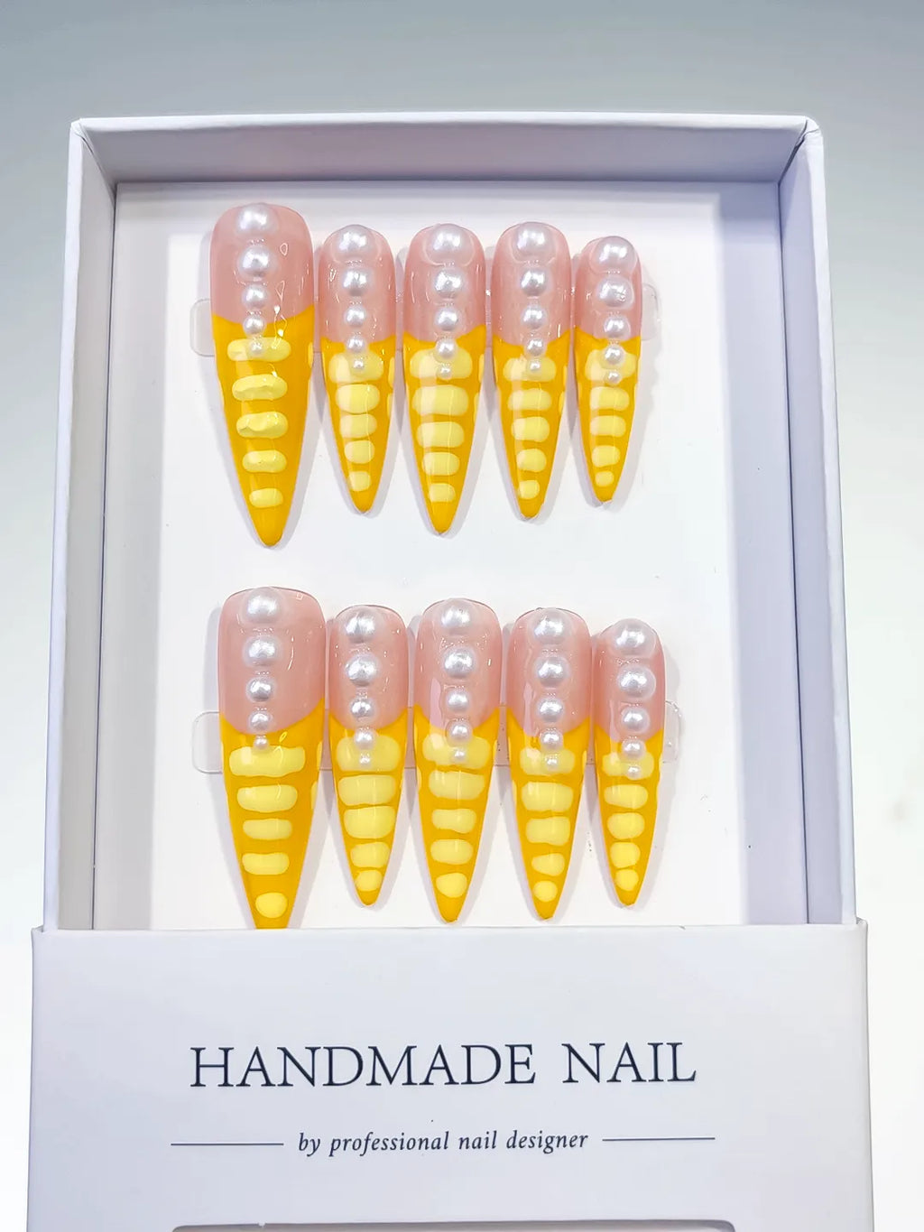 L033 - Long Nude Yellow Stiletto French tip Pearl