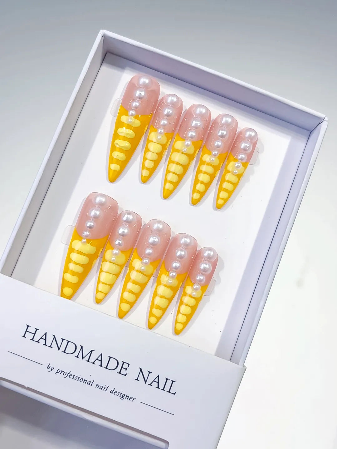 L033 - Long Nude Yellow Stiletto French tip Pearl