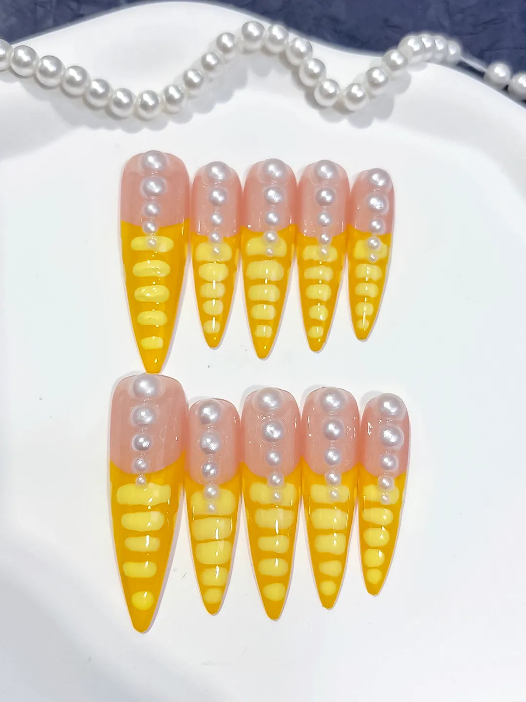 L033 - Long Nude Yellow Stiletto French tip Pearl