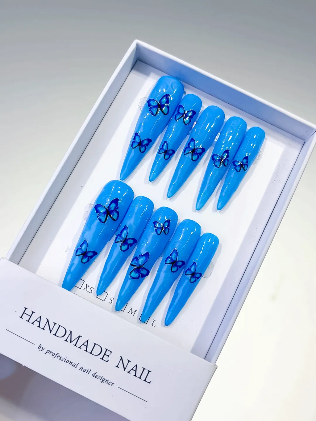 L067 - Long Blue Silver Stiletto Metallic Rhinestone