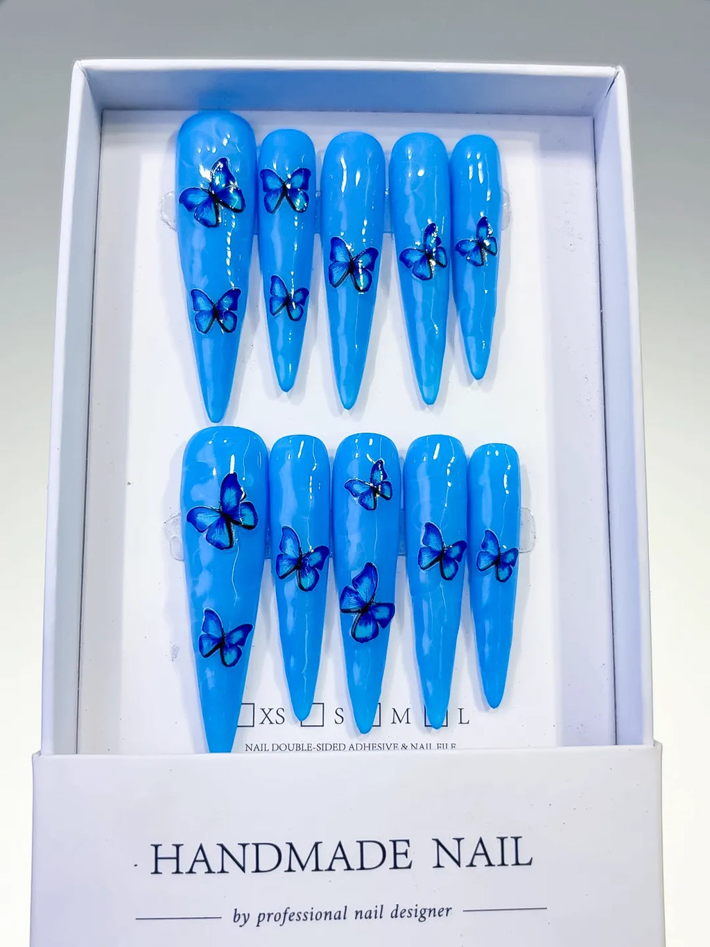 L067 - Long Blue Silver Stiletto Metallic Rhinestone