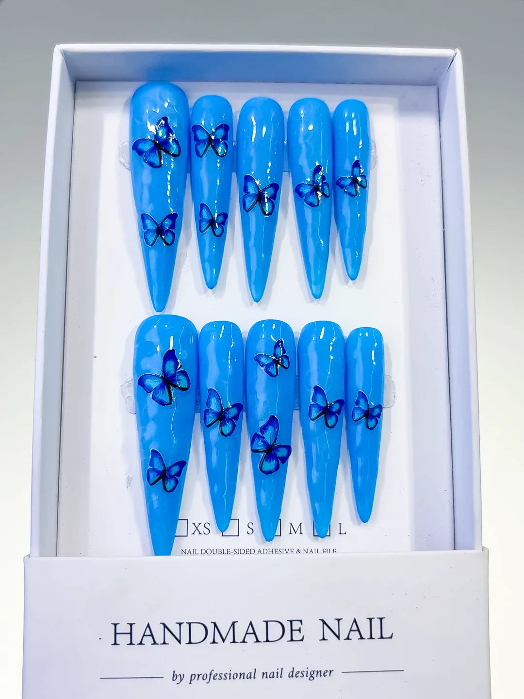 L067 - Long Blue Silver Stiletto Metallic Rhinestone