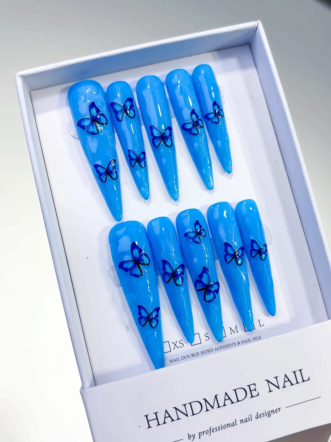 L067 - Long Blue Silver Stiletto Metallic Rhinestone