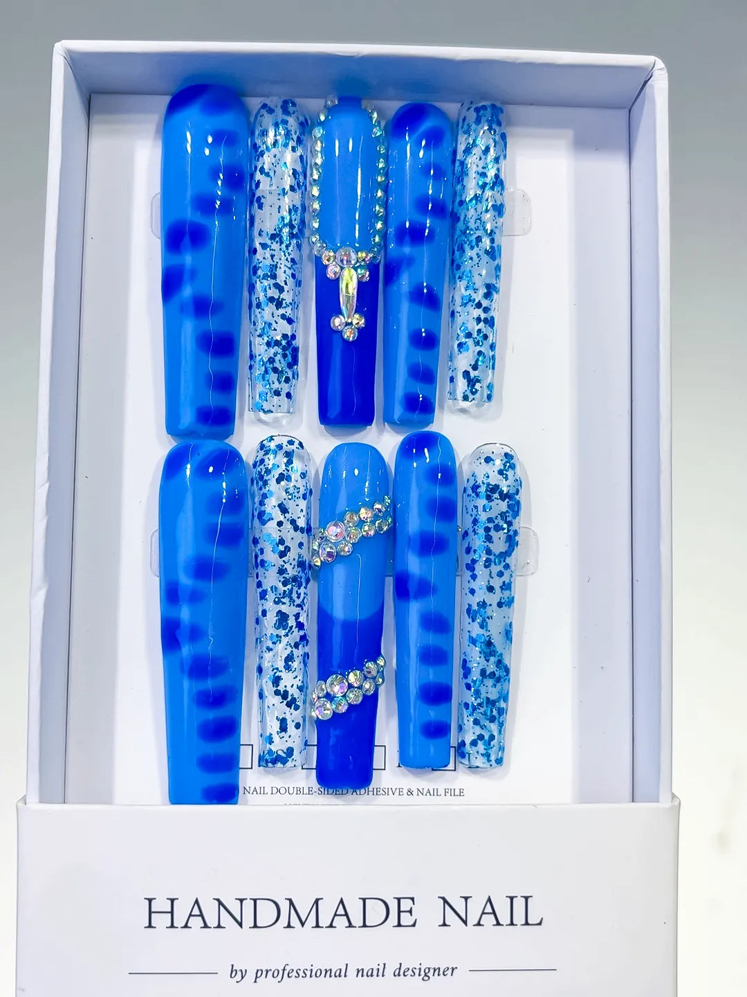 L073 - Long Blue White Square Glitter Cross Rhinestone