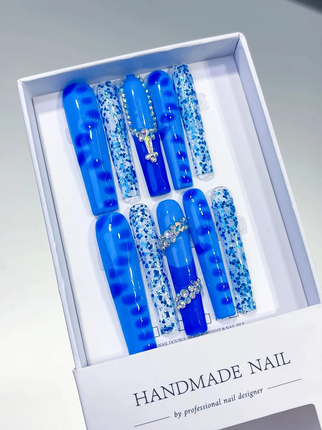 L073 - Long Blue White Square Glitter Cross Rhinestone
