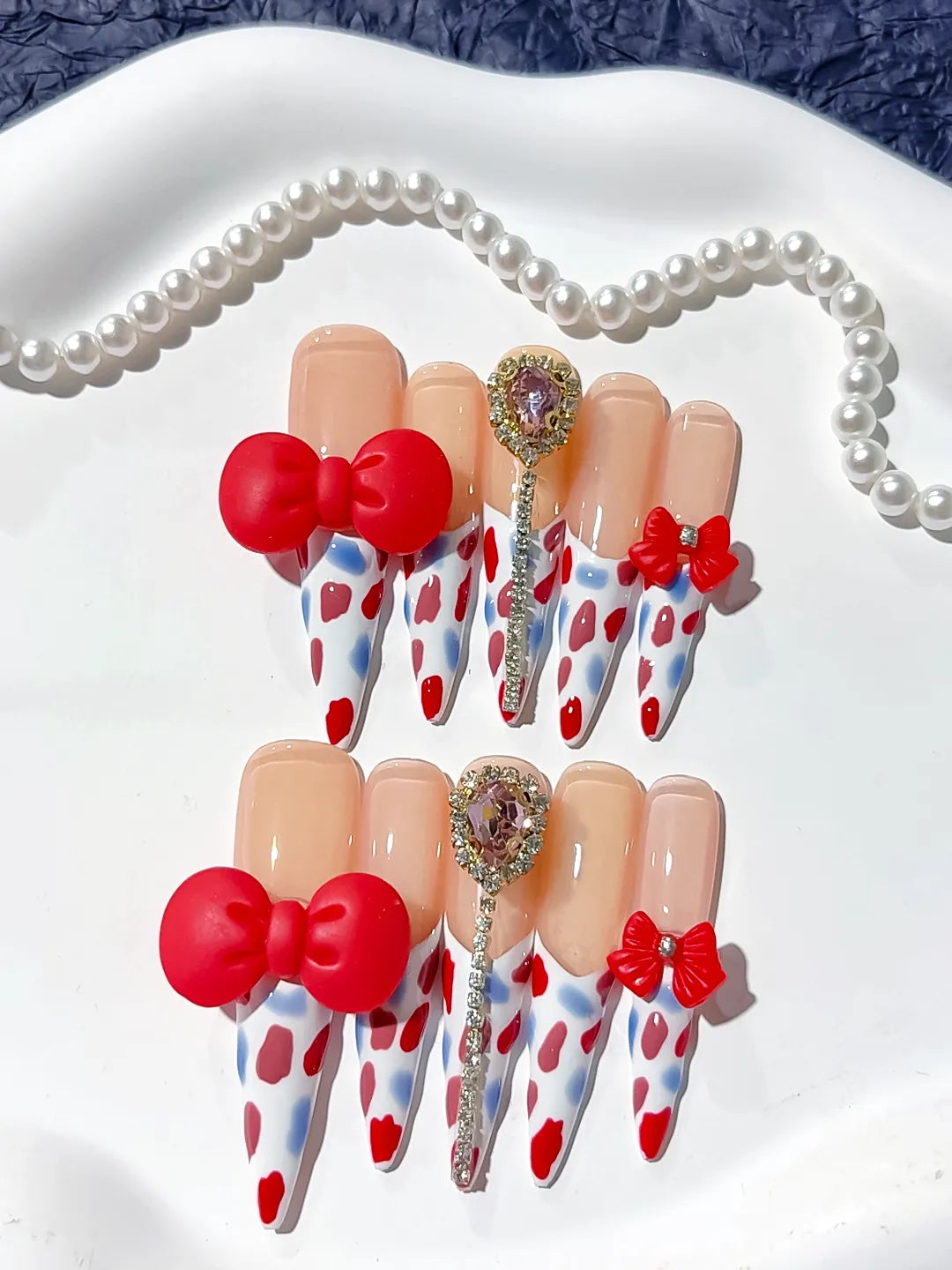 L079 - Long Nude White Stiletto Abstract Bow Heart