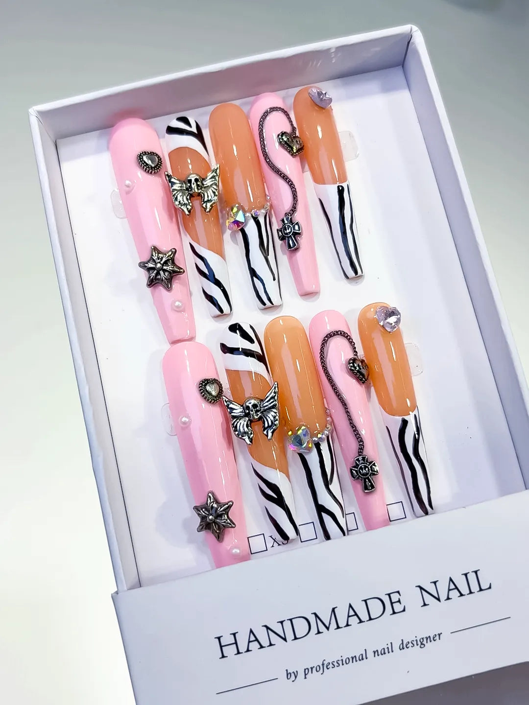 L081 - Long Pink Nude Coffin Abstract Star Bow
