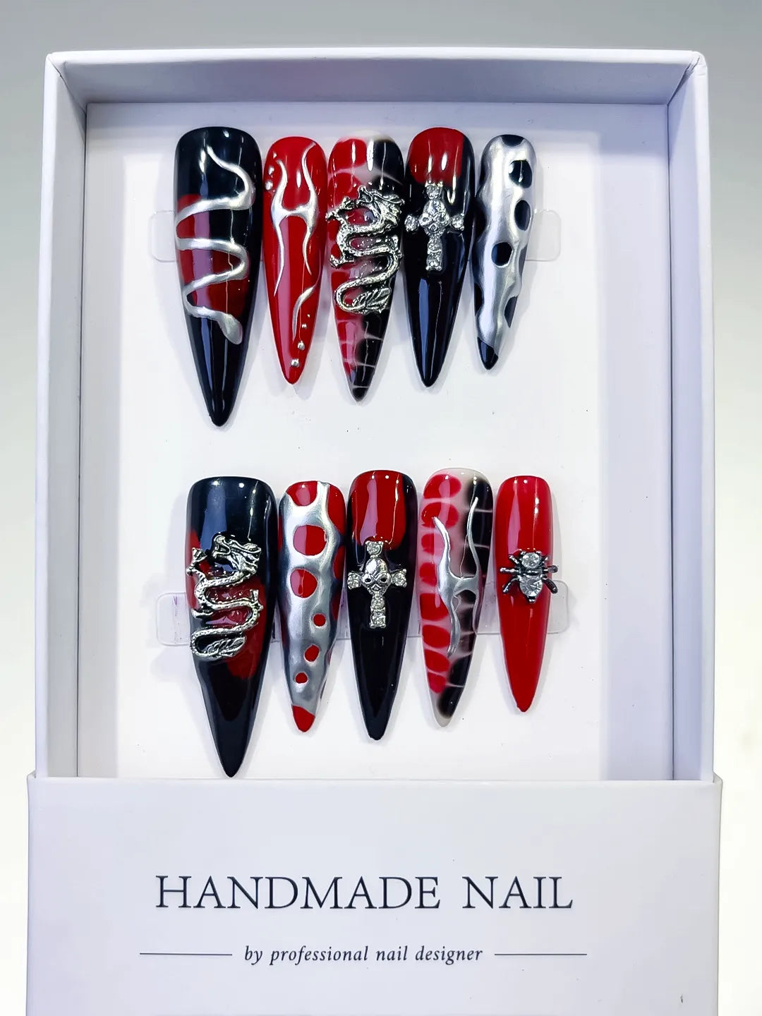 L134 - Long Black Red Stiletto Abstract Cross Snake
