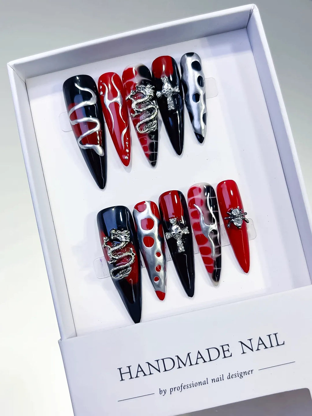 L134 - Long Black Red Stiletto Abstract Cross Snake