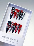 L134 - Long Black Red Stiletto Abstract Cross Snake