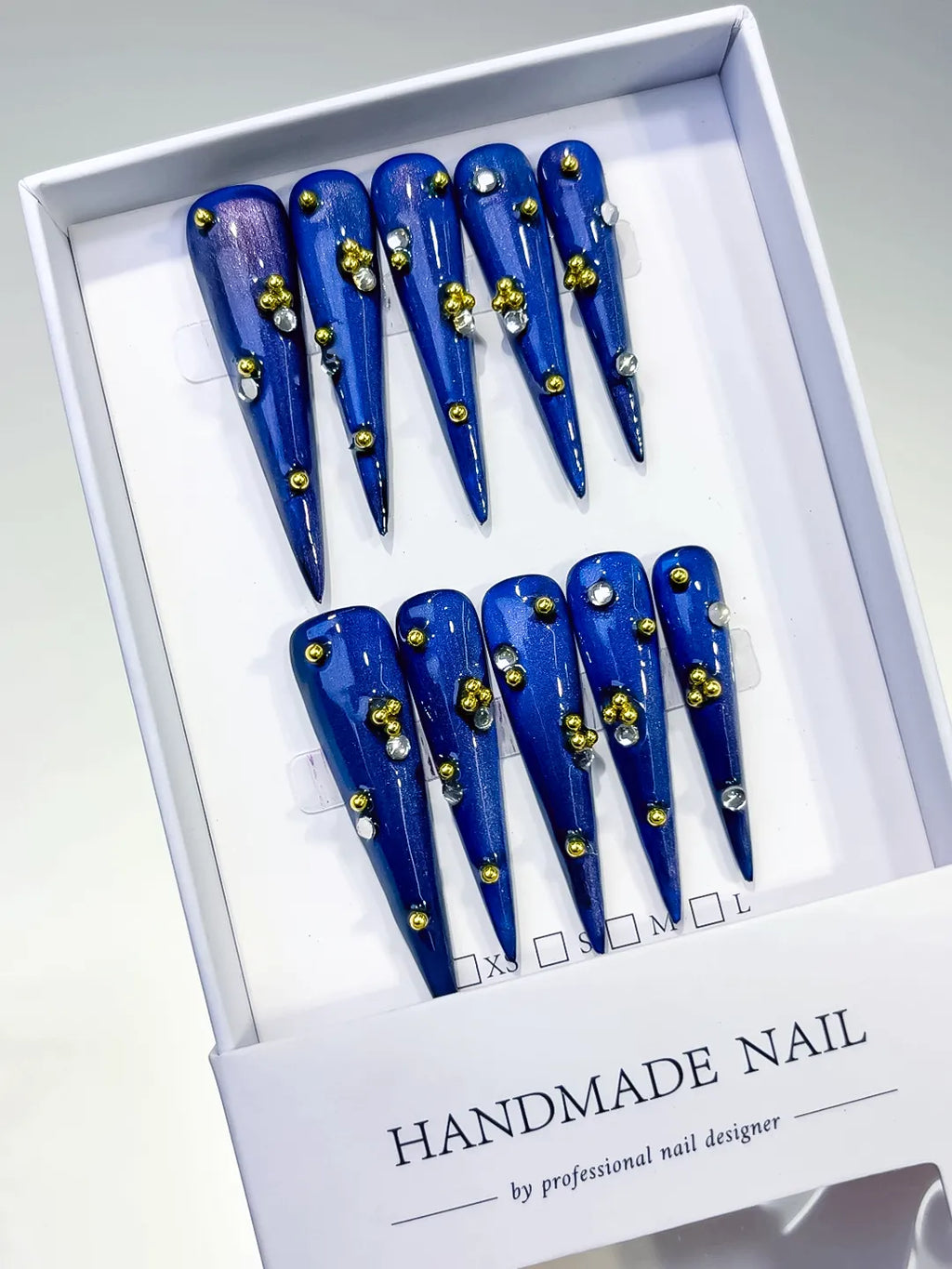 L136 - Long Blue Gold Stiletto Metallic Stud