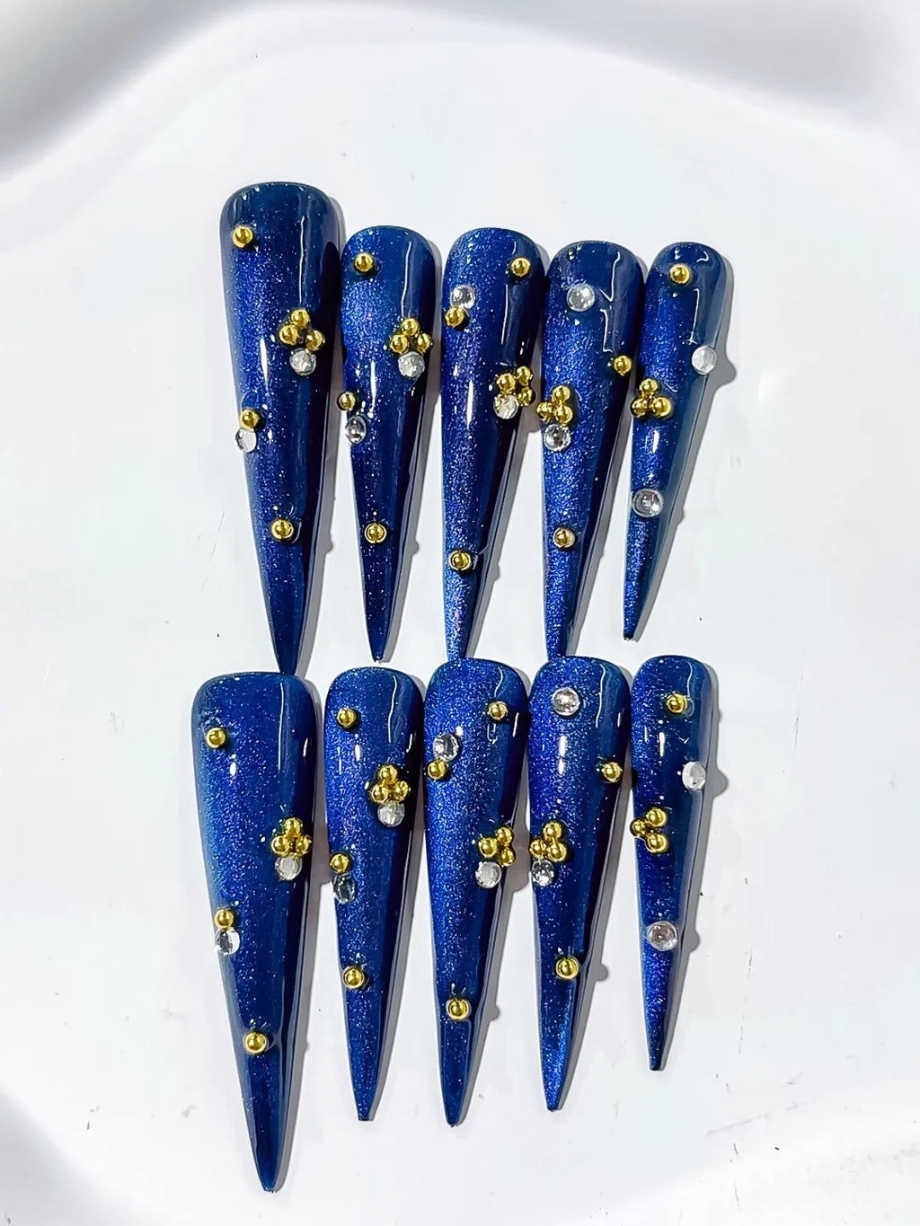 L136 - Long Blue Gold Stiletto Metallic Stud