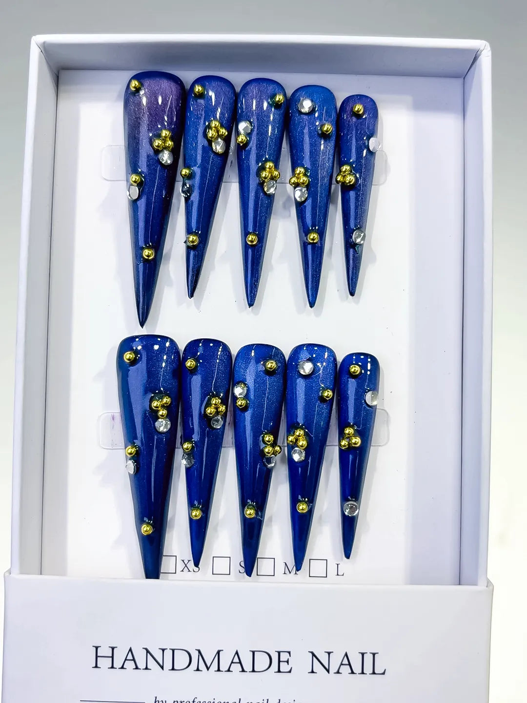L136 - Long Blue Gold Stiletto Metallic Stud
