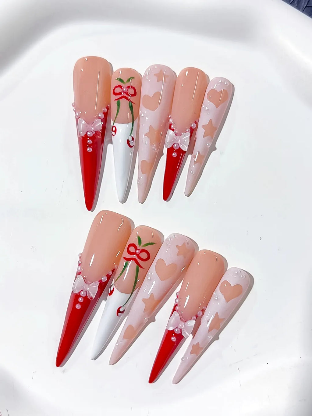 L153 - Long Nude Red Stiletto Abstract Cherry Bow