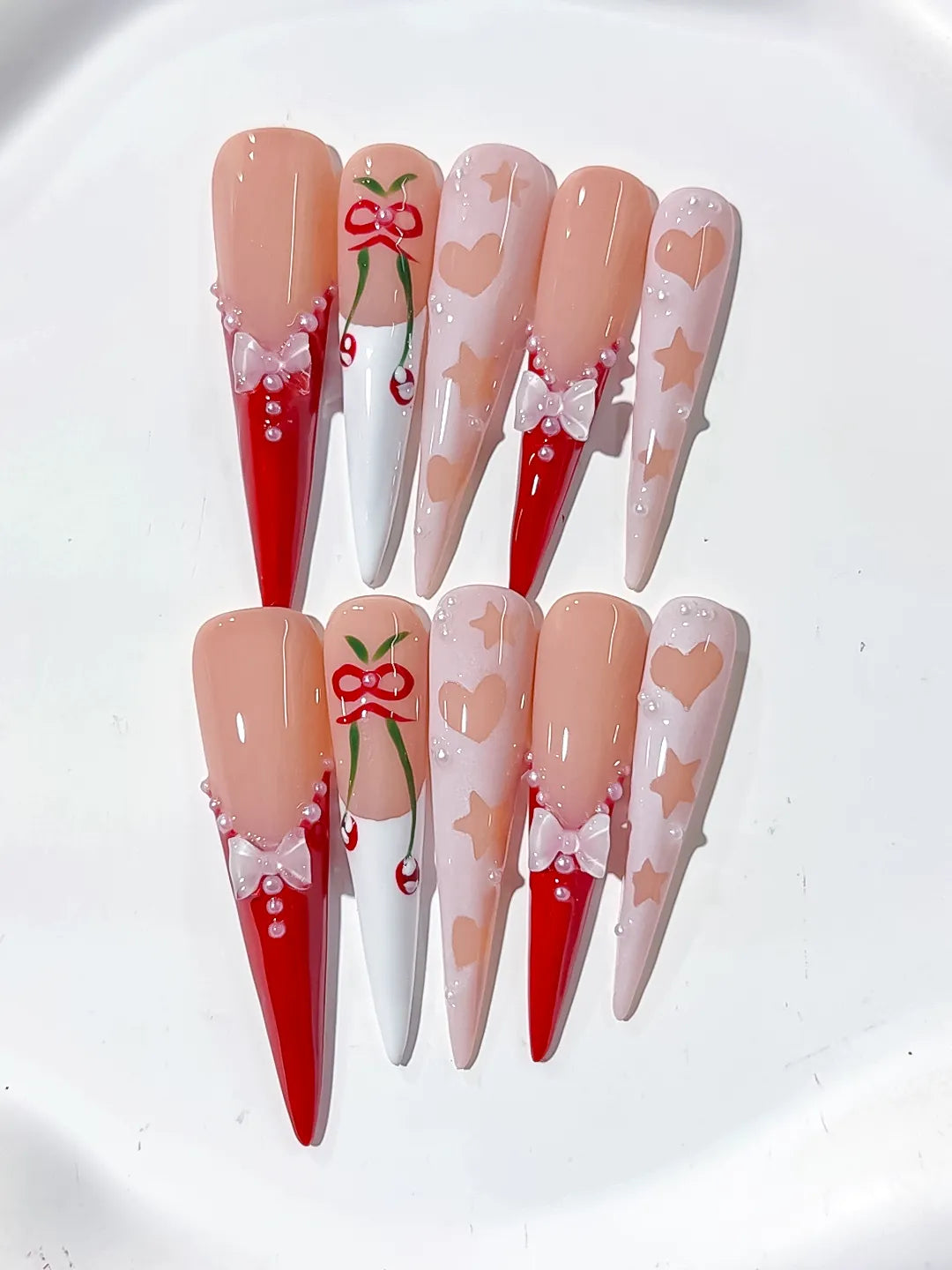 L153 - Long Nude Red Stiletto Abstract Cherry Bow