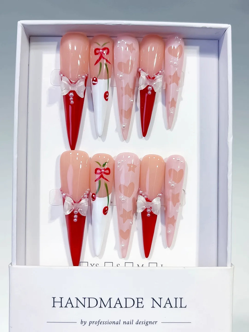 L153 - Long Nude Red Stiletto Abstract Cherry Bow