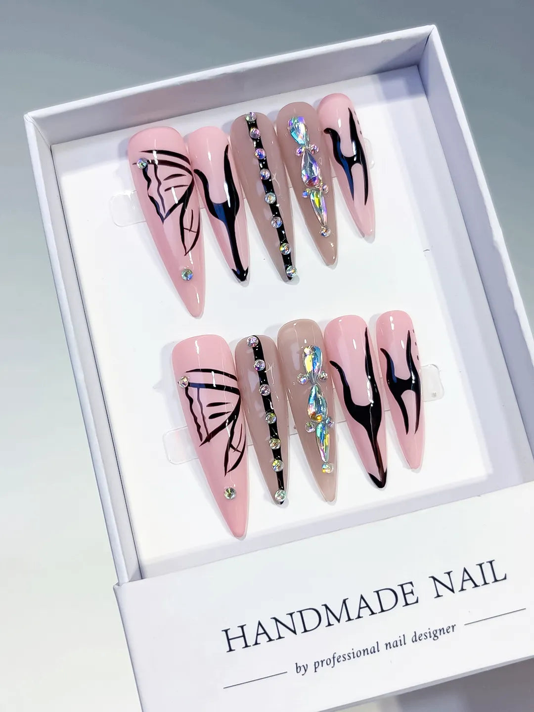 L157 - Long Pink Nude Stiletto Abstract Butterfly Rhinestone