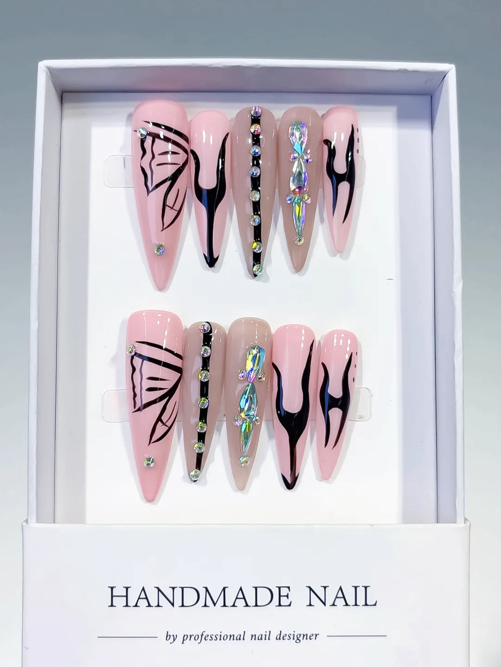 L157 - Long Pink Nude Stiletto Abstract Butterfly Rhinestone