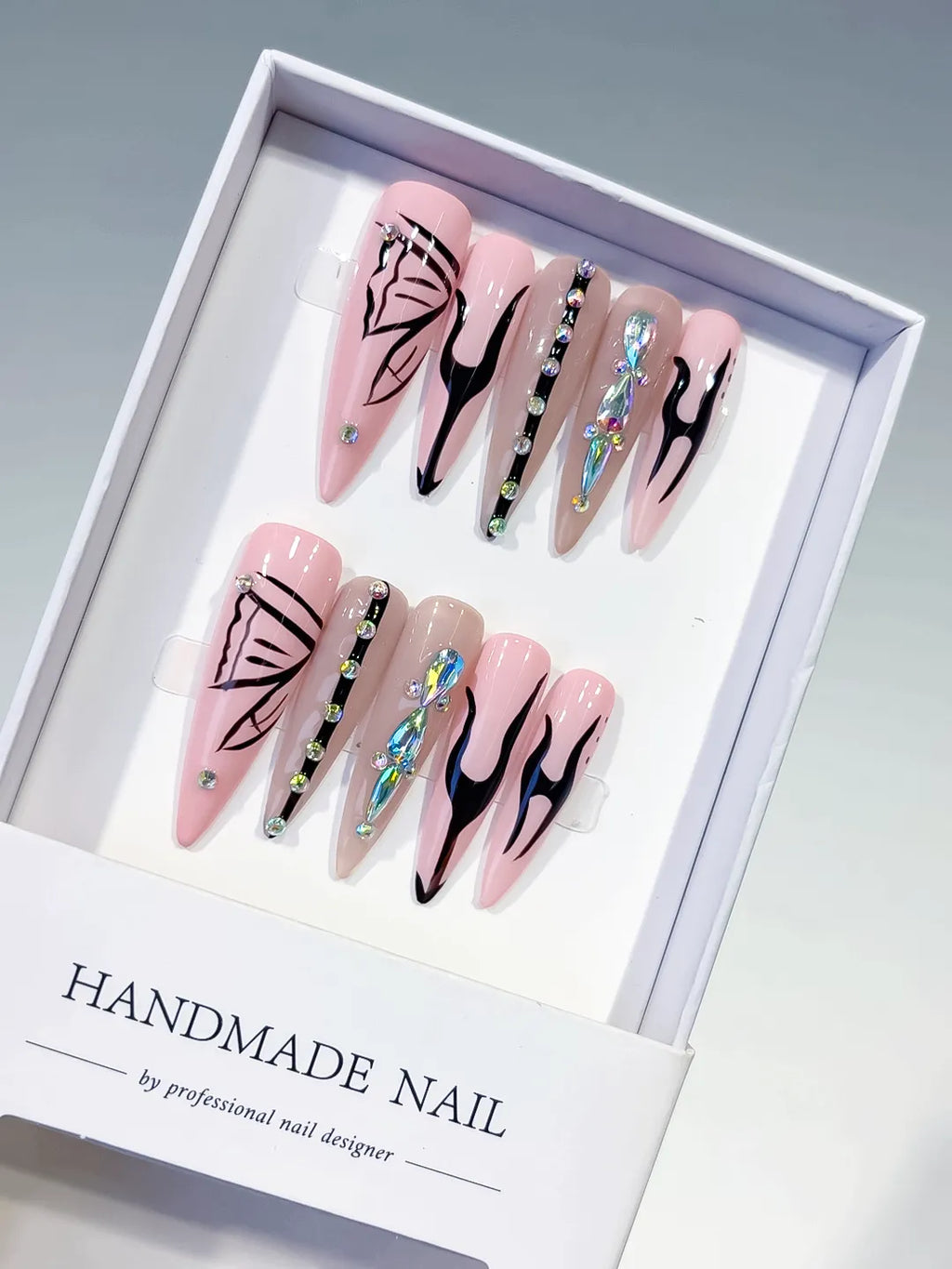 L157 - Long Pink Nude Stiletto Abstract Butterfly Rhinestone