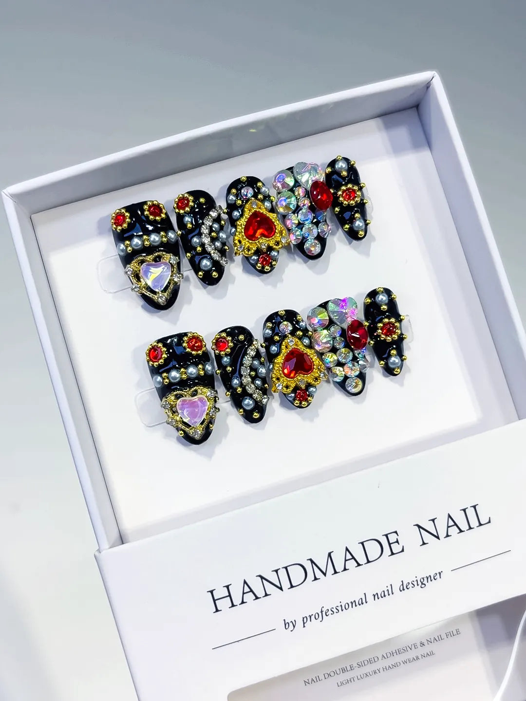L161 - Medium Black Gold Almond Glitter Heart Pearl