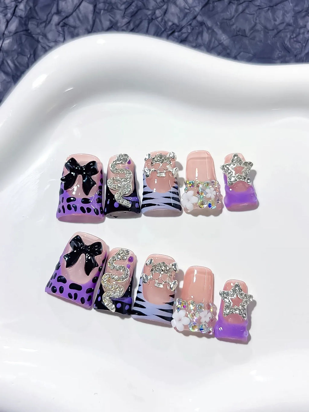 L192 - Short Nude Purple Duck Abstract Bow Snake
