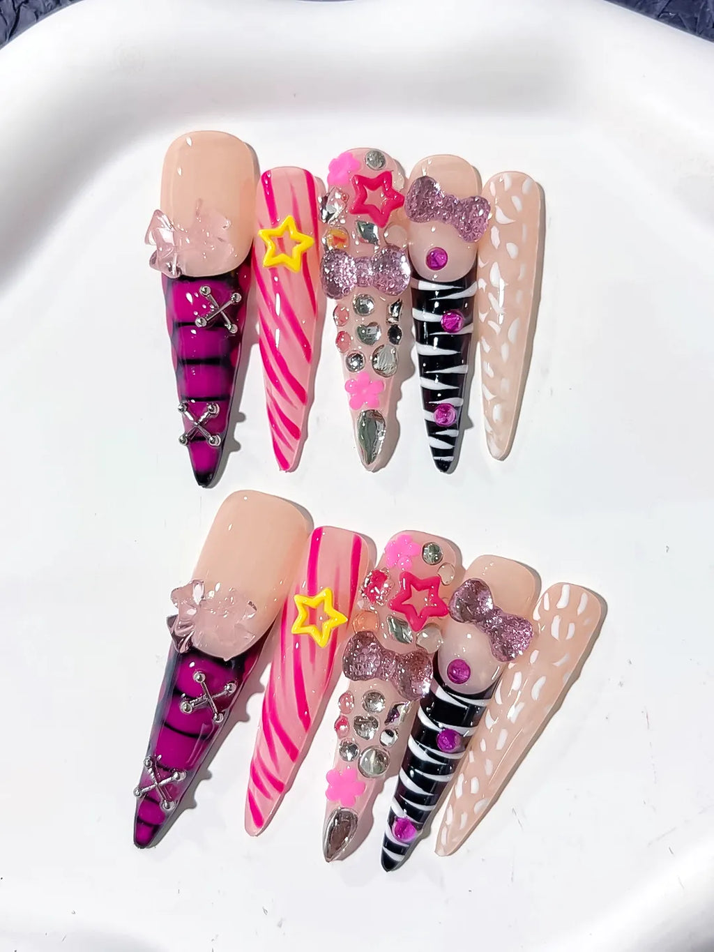 L199 - Long Nude Pink Stiletto Abstract Bow Star
