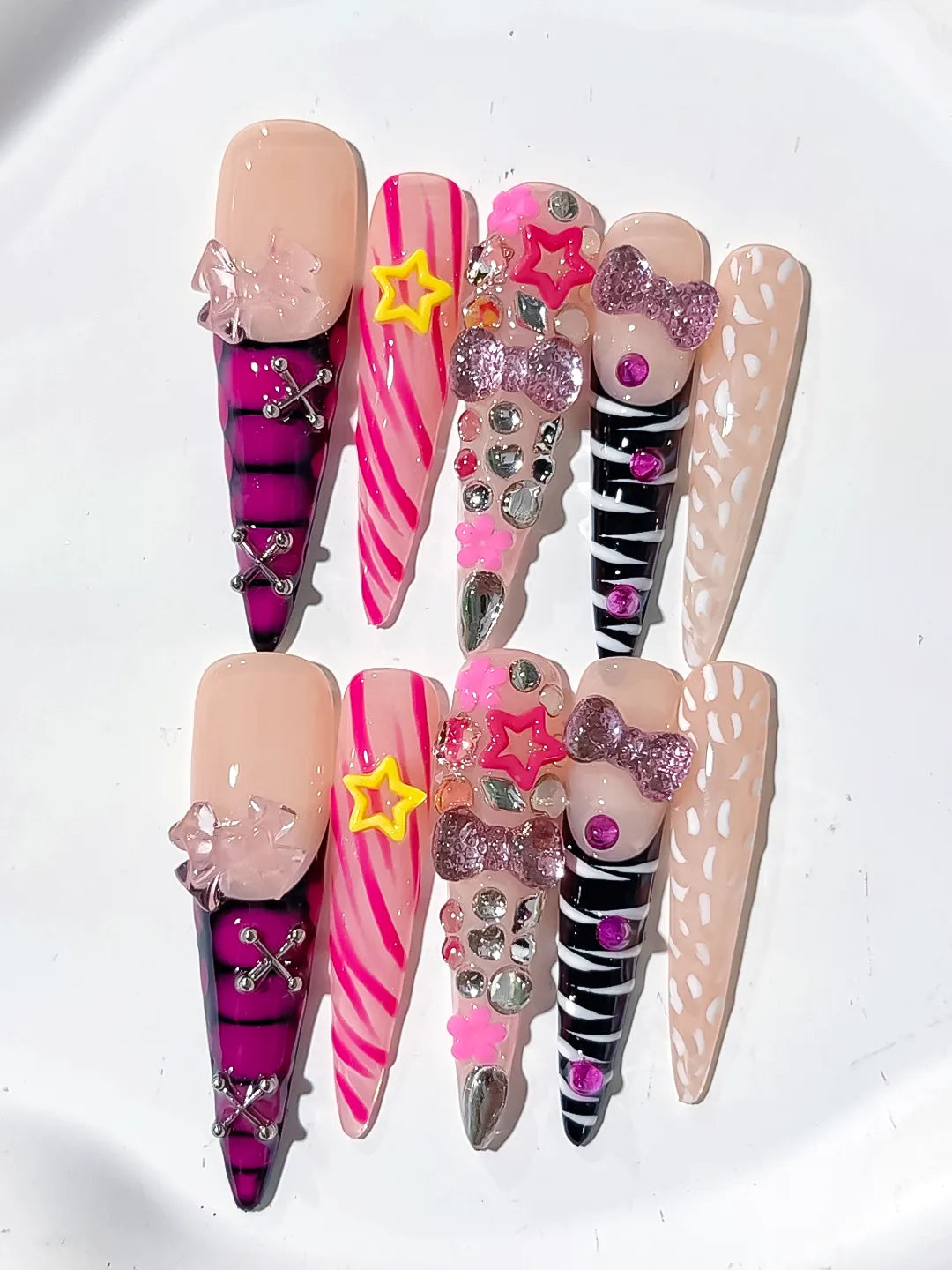 L199 - Long Nude Pink Stiletto Abstract Bow Star