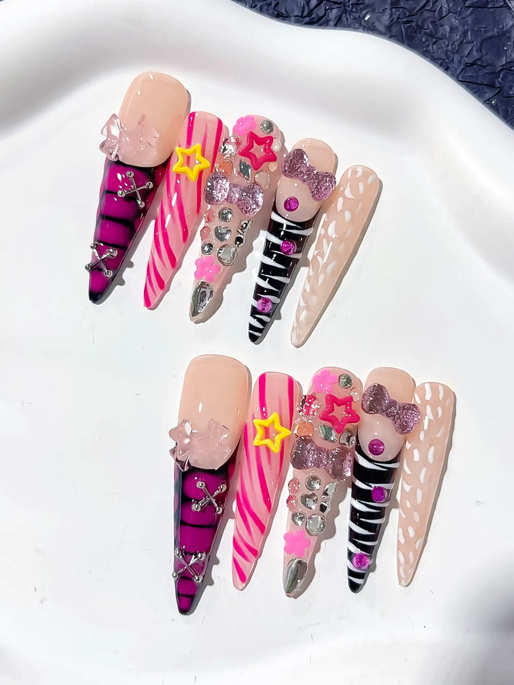 L199 - Long Nude Pink Stiletto Abstract Bow Star