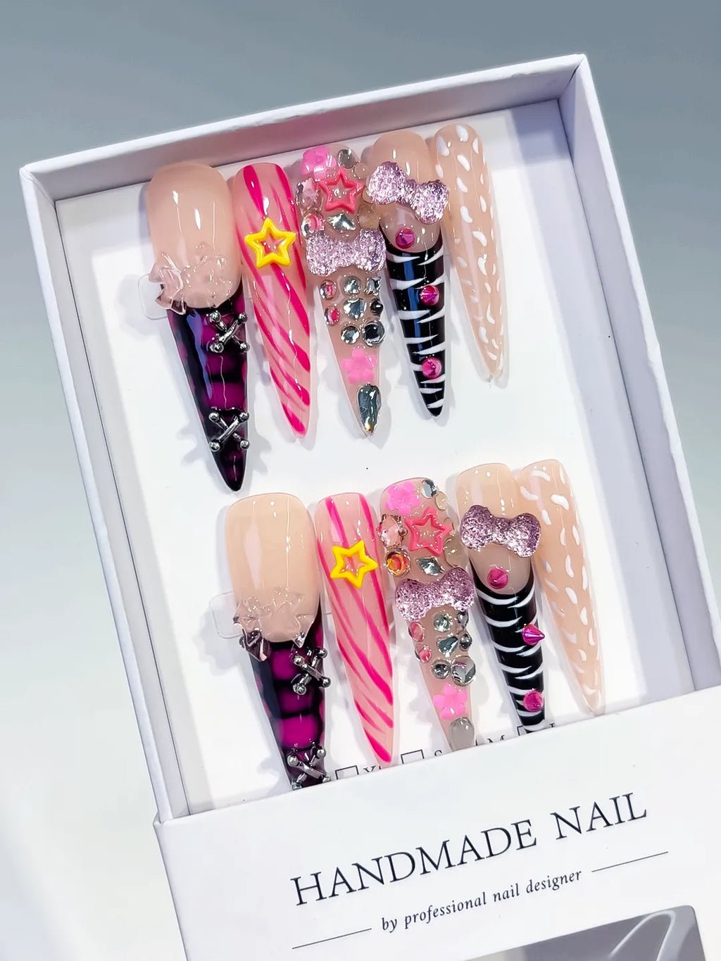 L199 - Long Nude Pink Stiletto Abstract Bow Star