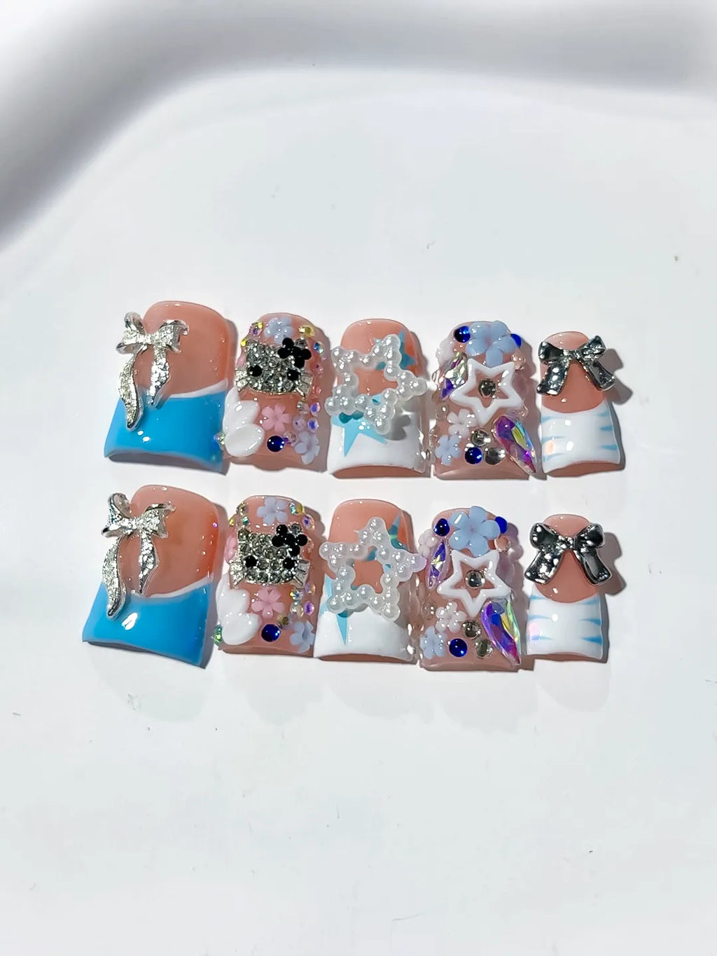 L262 - Short Nude Blue Duck Abstract Bow Flower