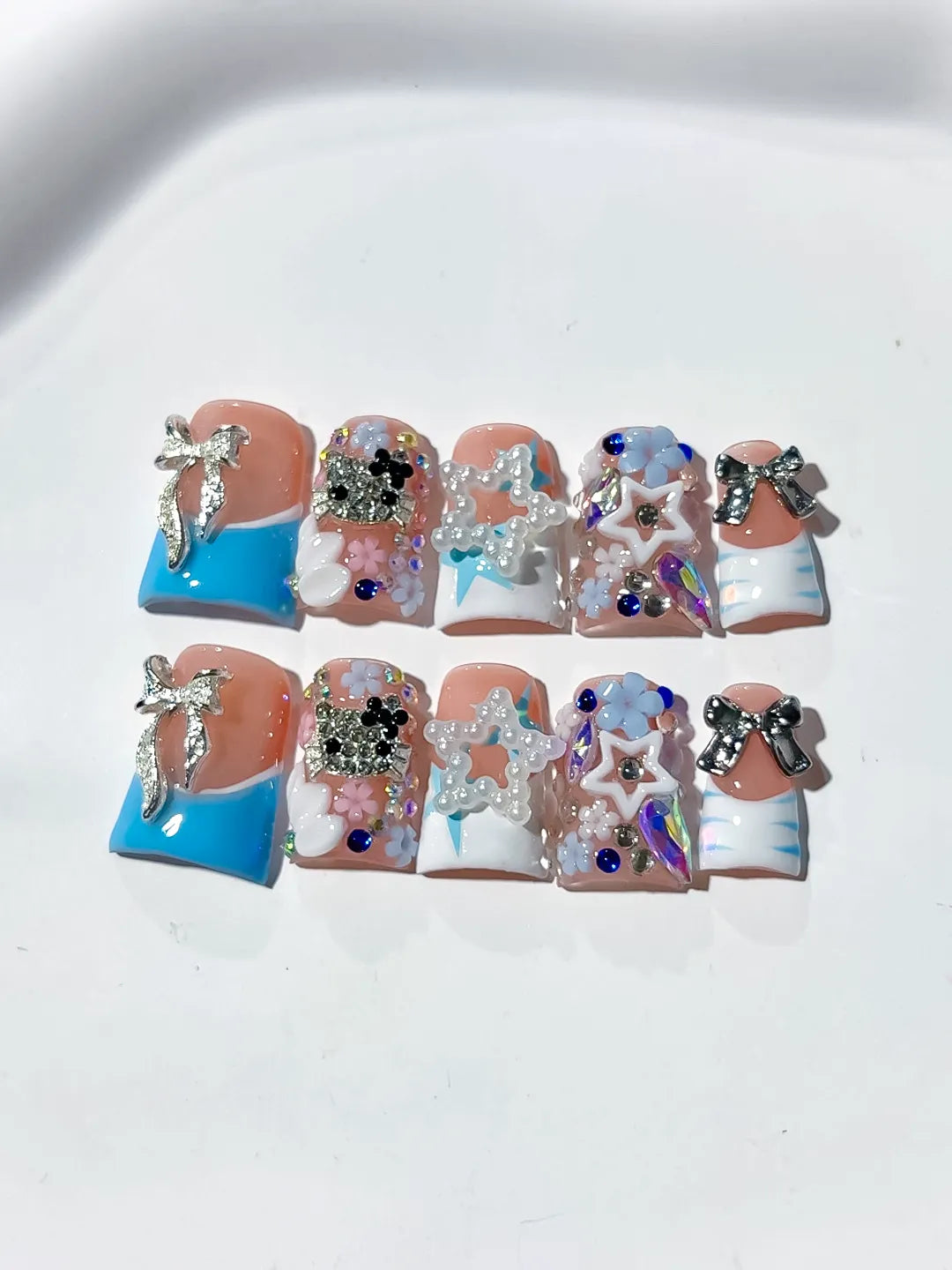 L262 - Short Nude Blue Duck Abstract Bow Flower