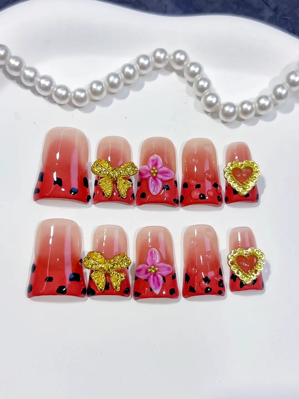 L271 - Short Nude Red Duck Abstract Bow Flower