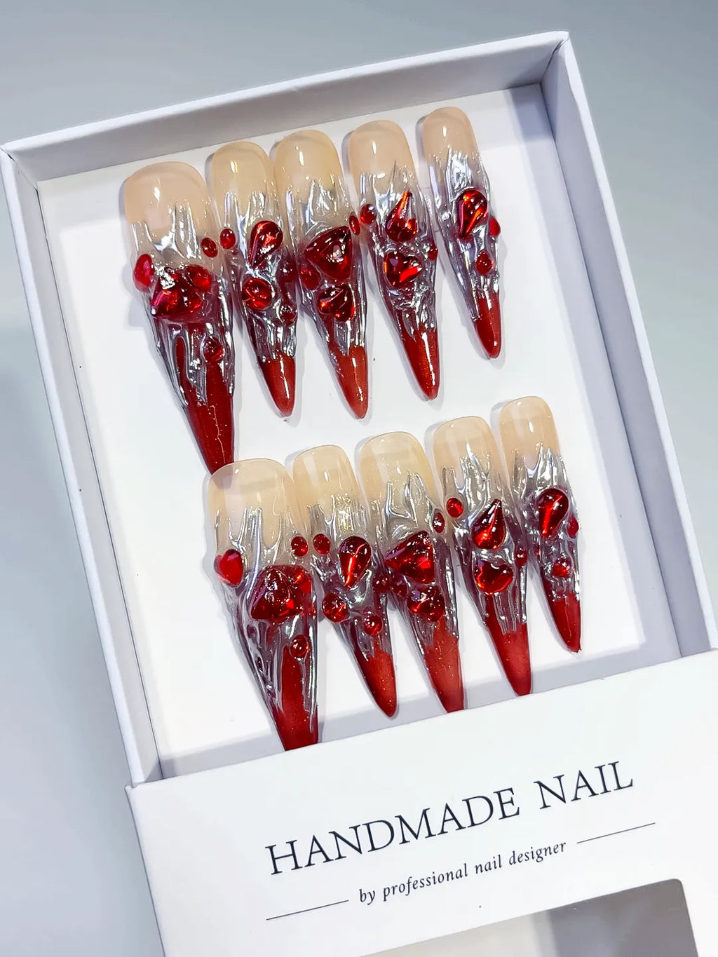 M009 - Long Red White Stiletto Abstract Bow Metallic Accent