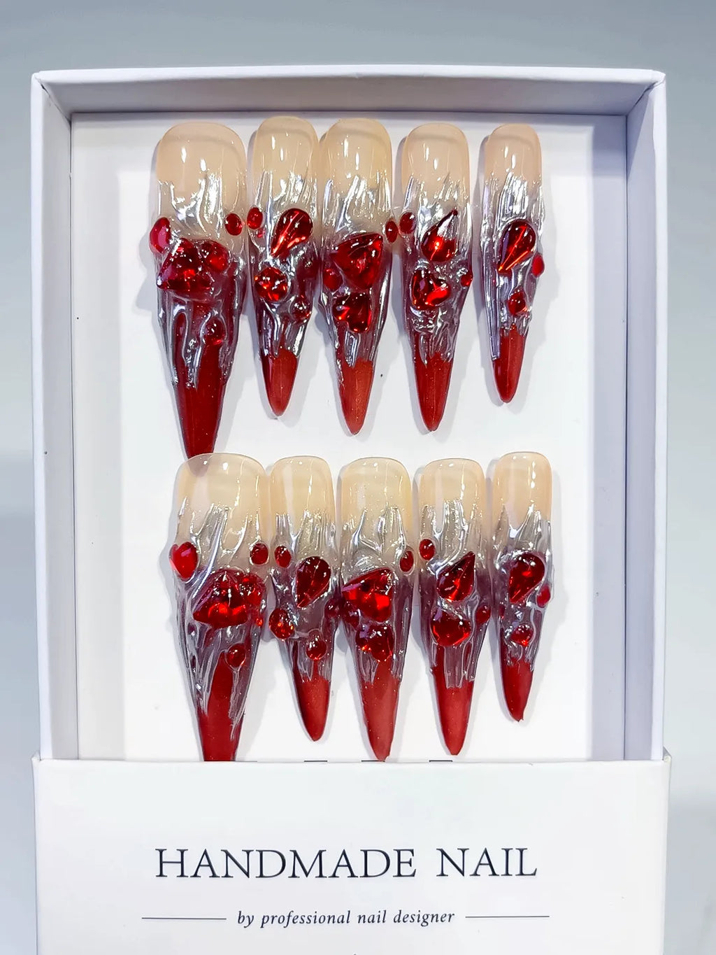M009 - Long Red White Stiletto Abstract Bow Metallic Accent