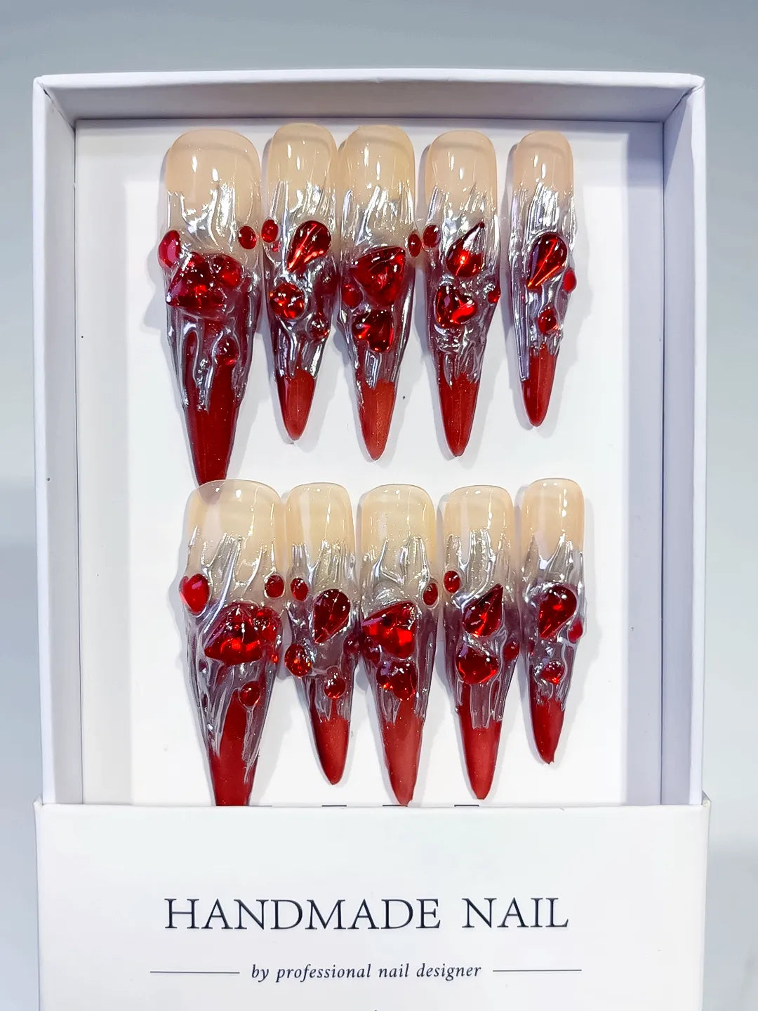 M009 - Long Red White Stiletto Abstract Bow Metallic Accent