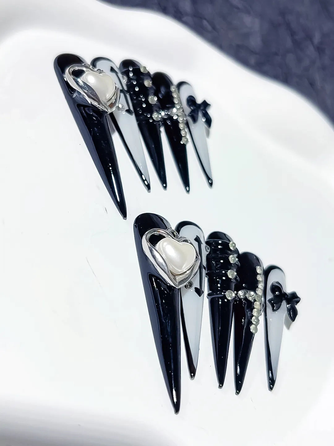 M071 - Long Black White Stiletto Abstract Bow Rhinestone