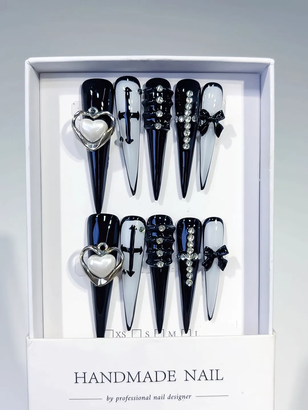 M071 - Long Black White Stiletto Abstract Bow Rhinestone