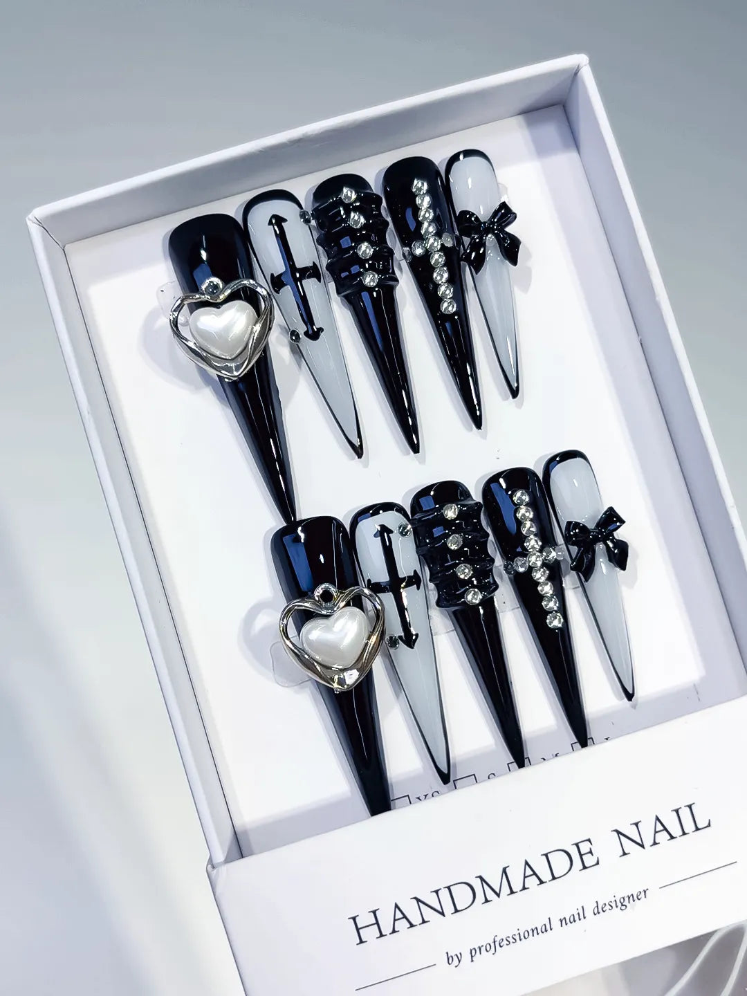 M071 - Long Black White Stiletto Abstract Bow Rhinestone