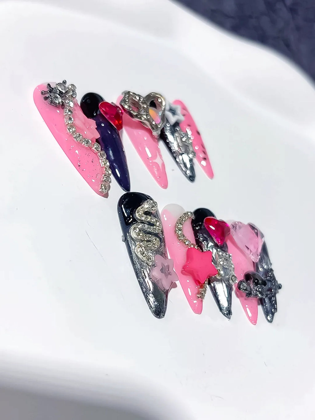 M074 - Long Pink Black Stiletto Abstract Bow Flower