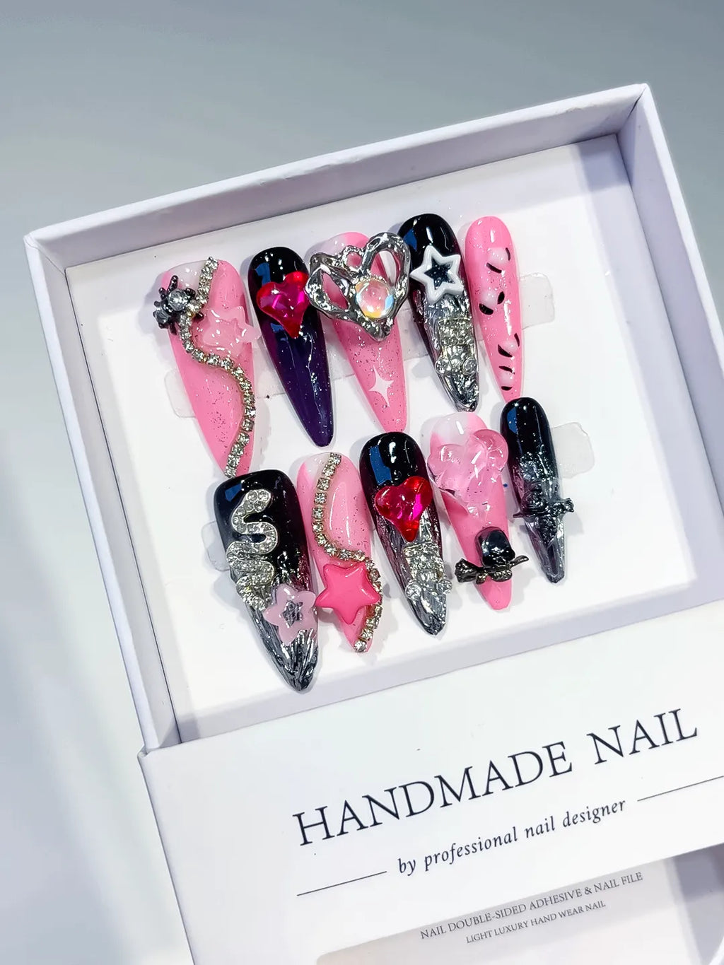M074 - Long Pink Black Stiletto Abstract Bow Flower