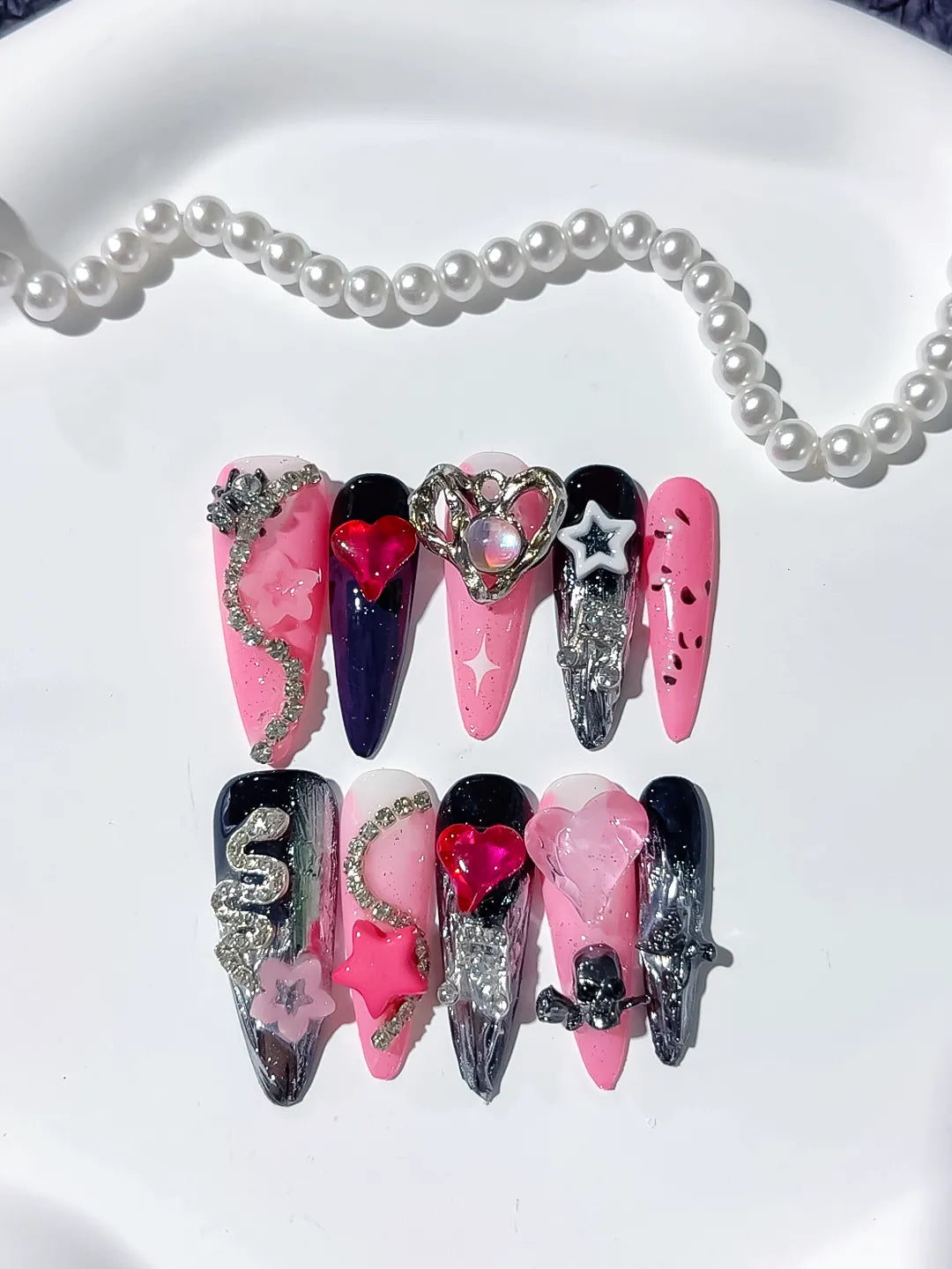 M074 - Long Pink Black Stiletto Abstract Bow Flower