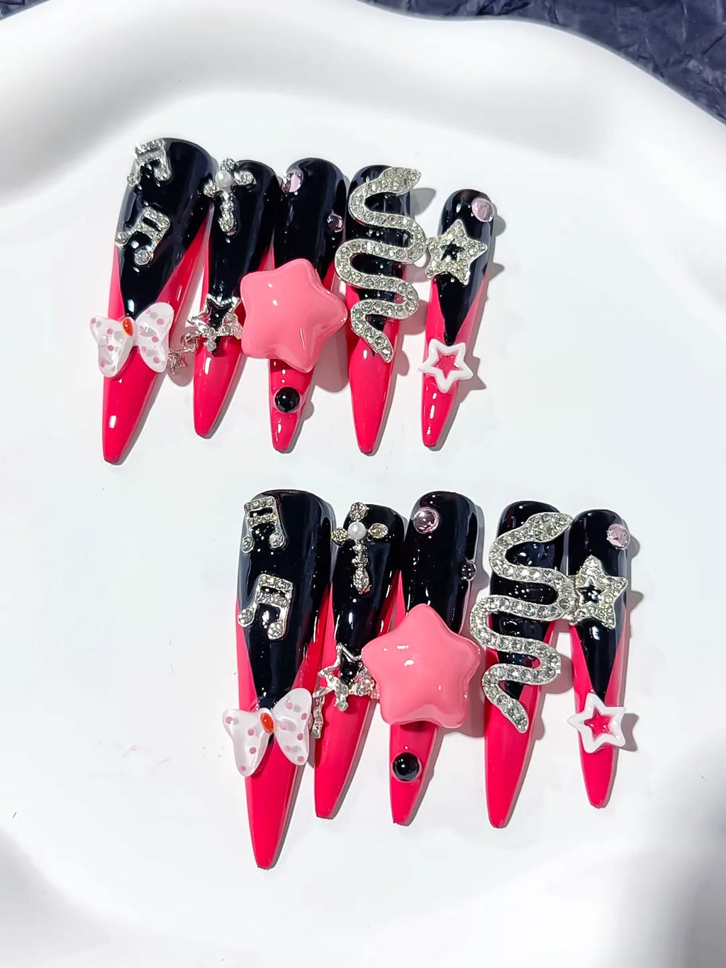 M101 - Long Pink Black Stiletto Abstract Bow Rhinestone